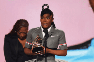 a woman holding a trophy