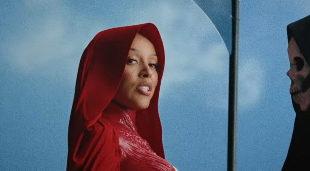 Doja Cat Dances With The Devil In "Paint The Town Red" Video