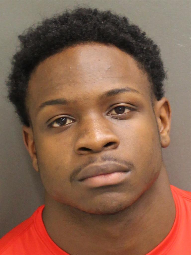 A picture containing person, wall, indoor, red

Description automatically generated