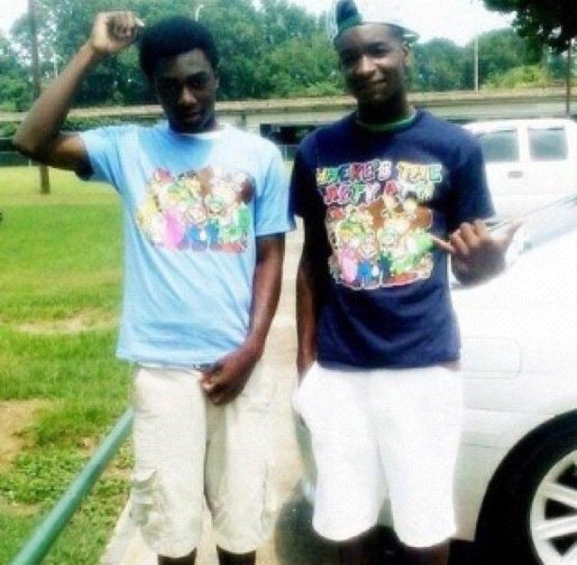 Two men posing for a picture
Description automatically generated with medium confidence