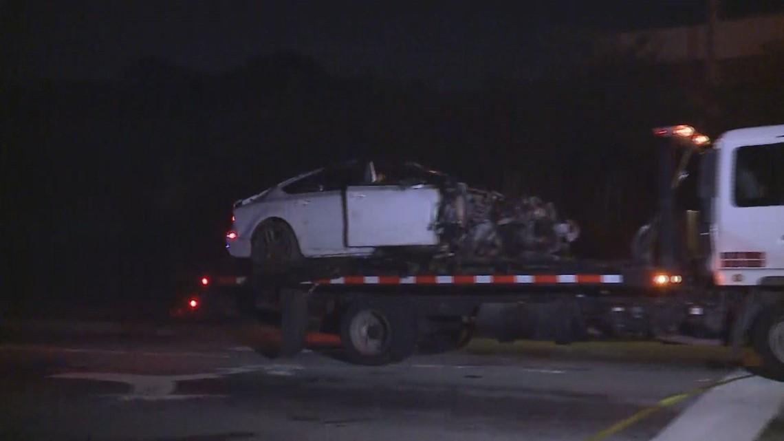 A picture containing text, road, outdoor, truck

Description automatically generated