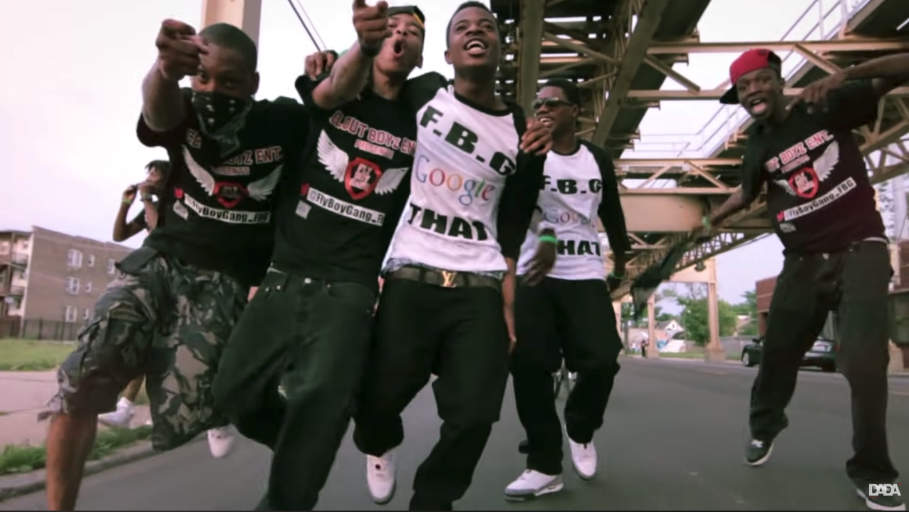 A group of men running on a street

Description automatically generated with low confidence