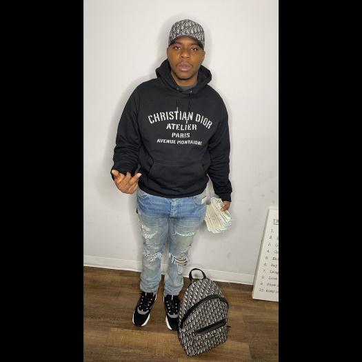 A picture containing text, person, person, standing

Description automatically generated