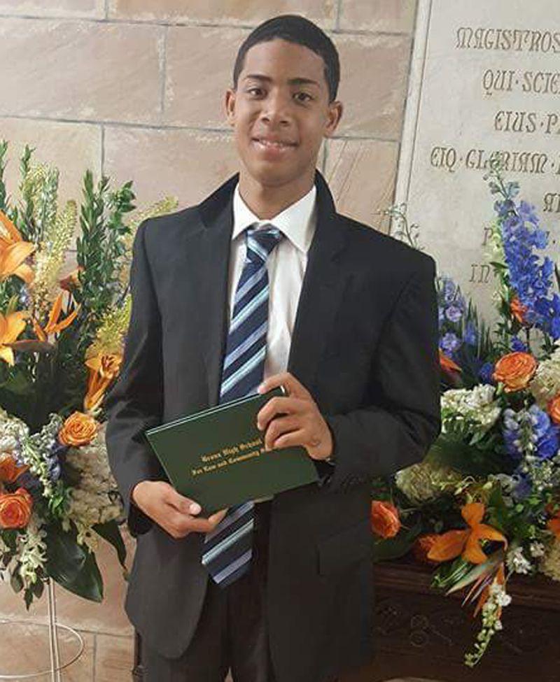 A person holding a book

Description automatically generated with low confidence