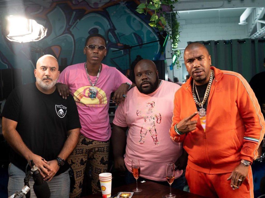 A group of men posing for a photoDescription automatically generated