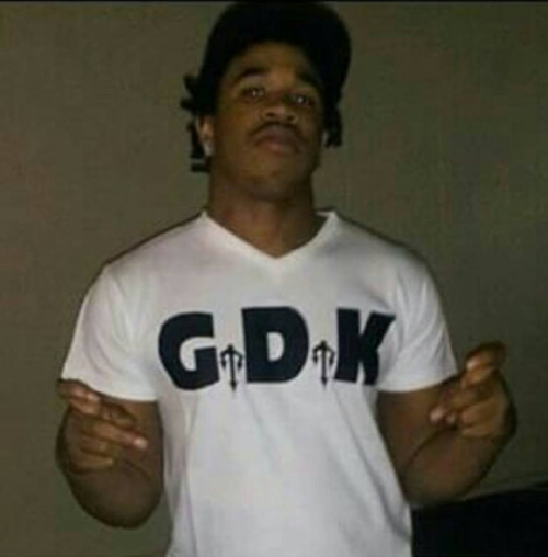 The Legacy Of T.Roy: The Chiraq Rambo 32 A person wearing a white shirt
Description automatically generated with medium confidence