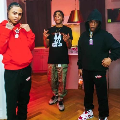 A group of men posing for a picture

Description automatically generated