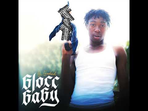 A person holding a guitarDescription automatically generated with medium confidence