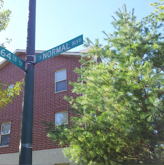 A street sign on a pole
Description automatically generated with low confidence