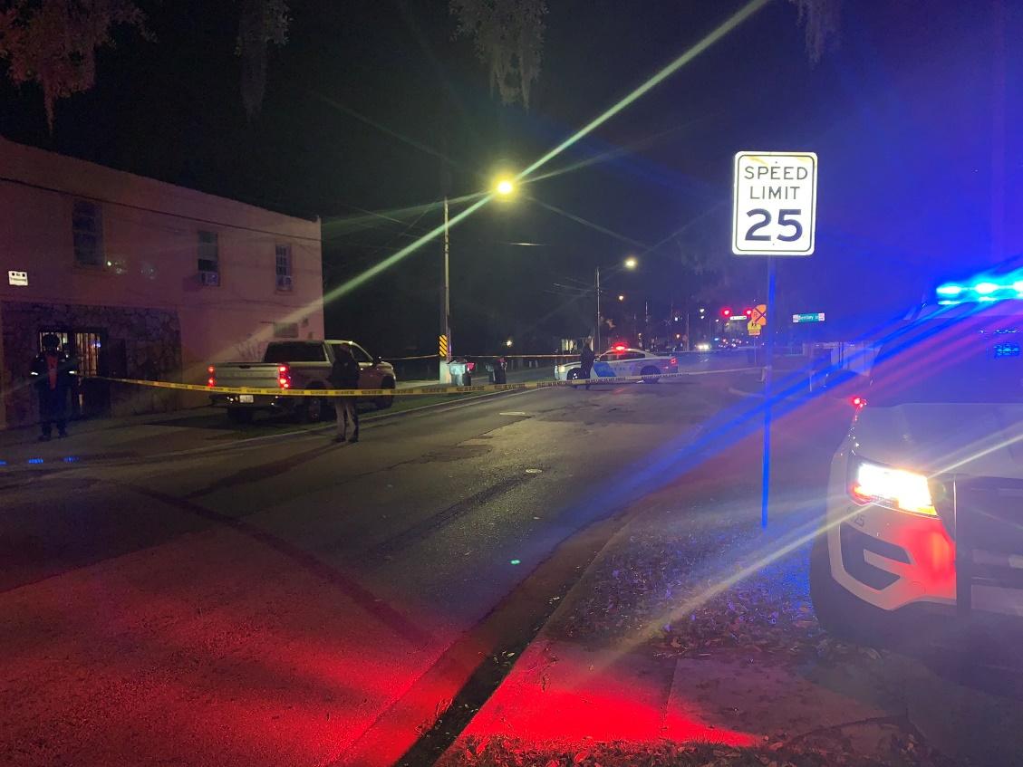 A picture containing text, outdoor, night, scene

Description automatically generated