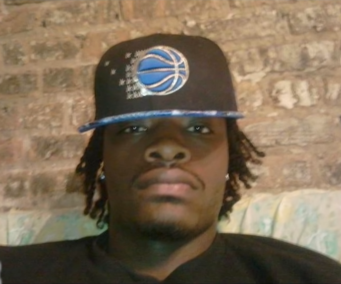 The Legacy Of T.Roy: The Chiraq Rambo 30 A person wearing a hat
Description automatically generated with medium confidence