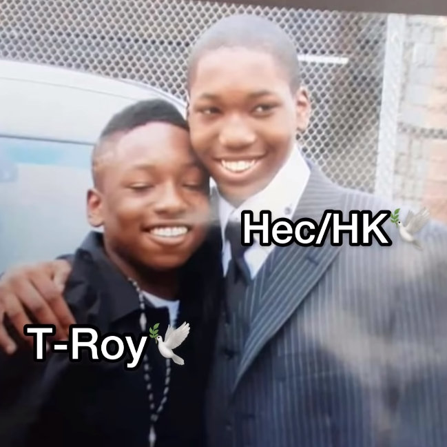 The Legacy Of T.Roy: The Chiraq Rambo 5 A picture containing person, posing, suit
Description automatically generated