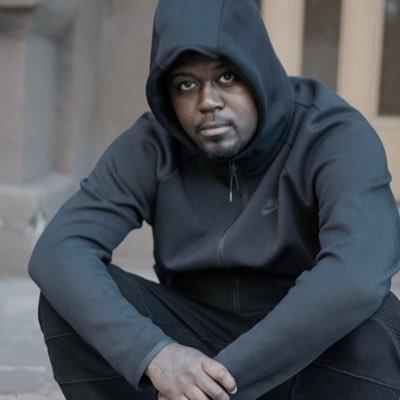 A person in a hoodie
Description automatically generated with medium confidence