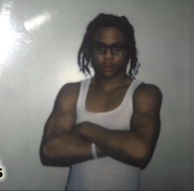 A person posing for a picture

Description automatically generated with medium confidence