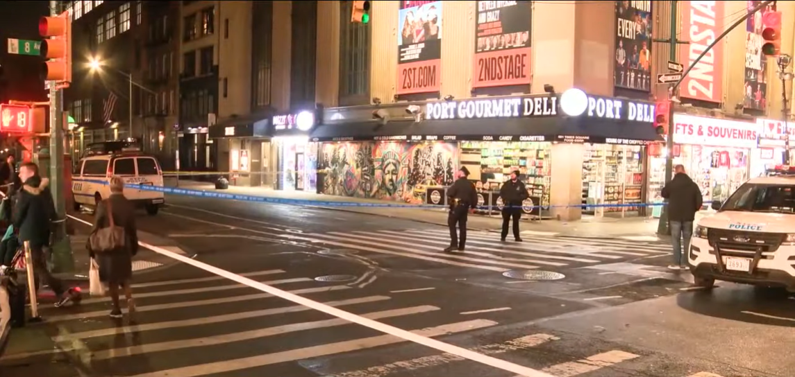People crossing a street in a city
Description automatically generated with low confidence