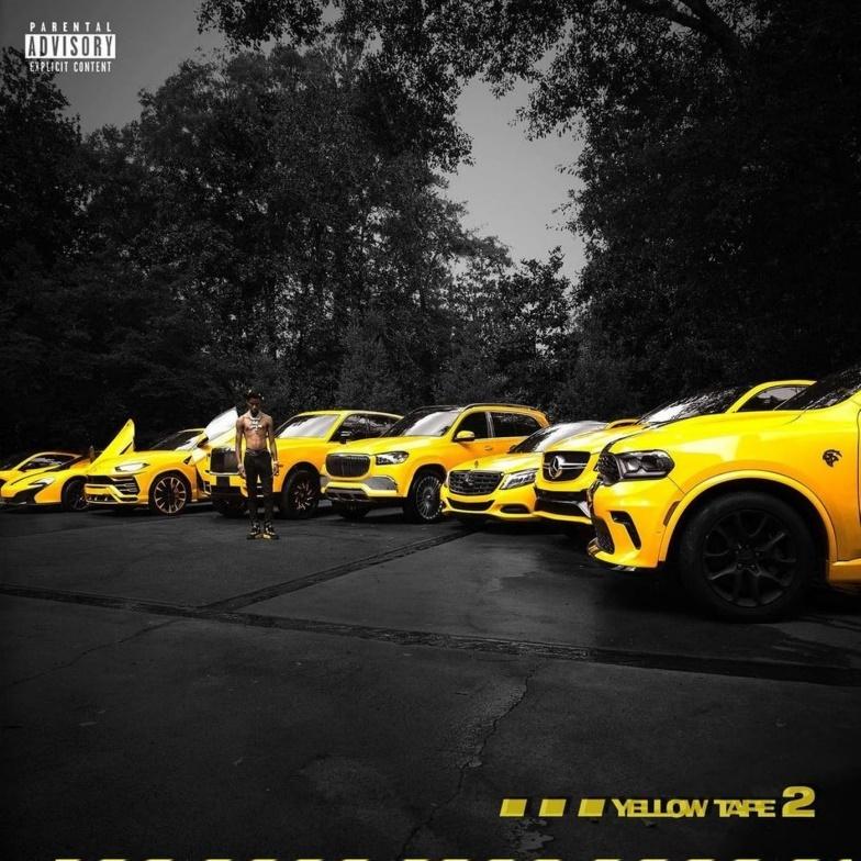 Key Glock: The Heir To The PRE Empire 17 A row of yellow carsDescription automatically generated with low confidence