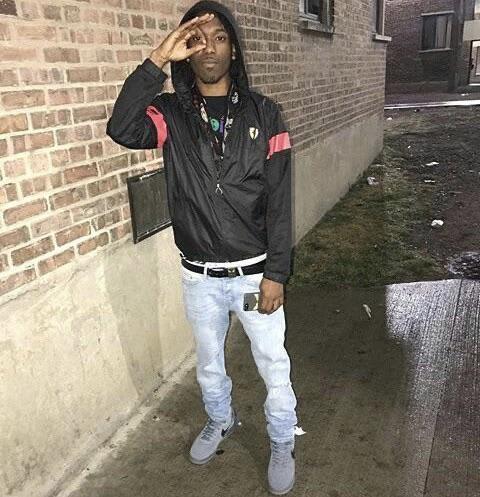 The Legacy Of T.Roy: The Chiraq Rambo 73 A picture containing building, outdoor, person, standing
Description automatically generated
