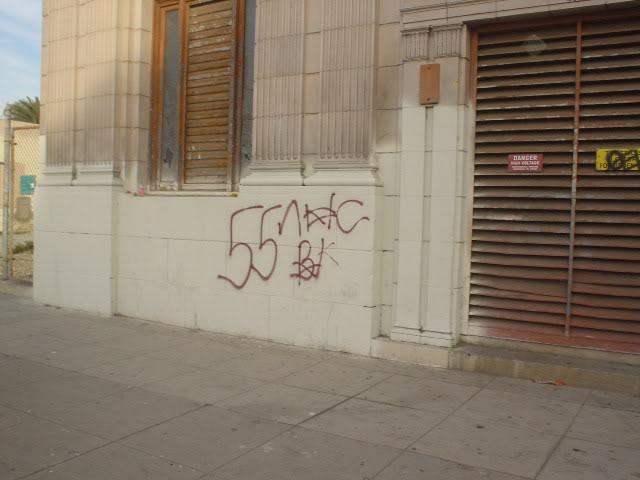 A building with graffiti on itDescription automatically generated with medium confidence