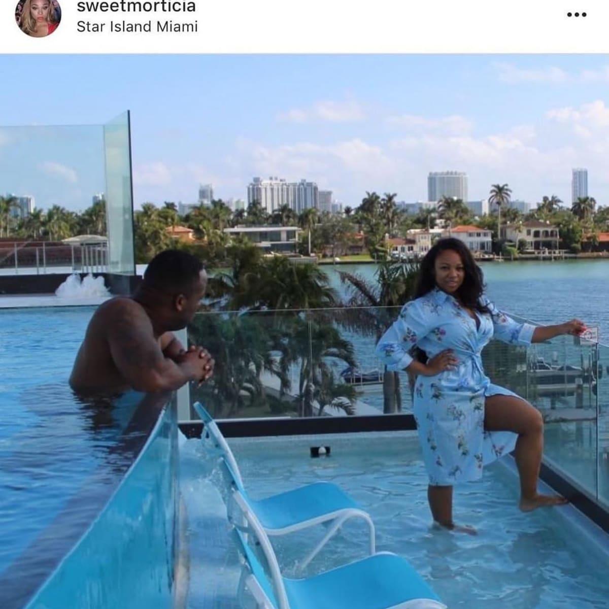 A person and person in a pool

Description automatically generated with medium confidence