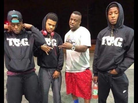 A group of men posing for a picture
Description automatically generated with medium confidence