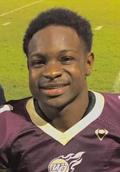 A picture containing text, grass, person, outdoor

Description automatically generated