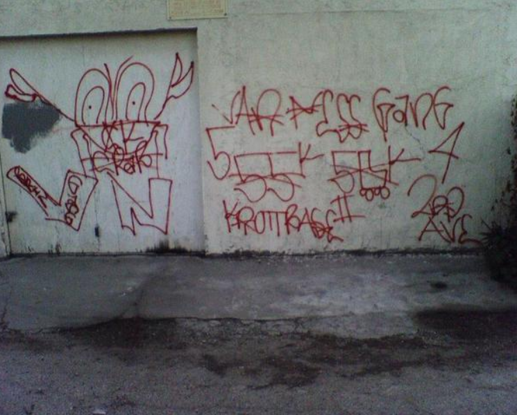 Graffiti on a wallDescription automatically generated