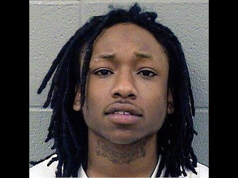 The Legacy Of T.Roy: The Chiraq Rambo 45 A picture containing text, person, posing
Description automatically generated