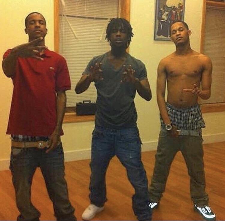 A group of men posing for a picture
Description automatically generated with medium confidence