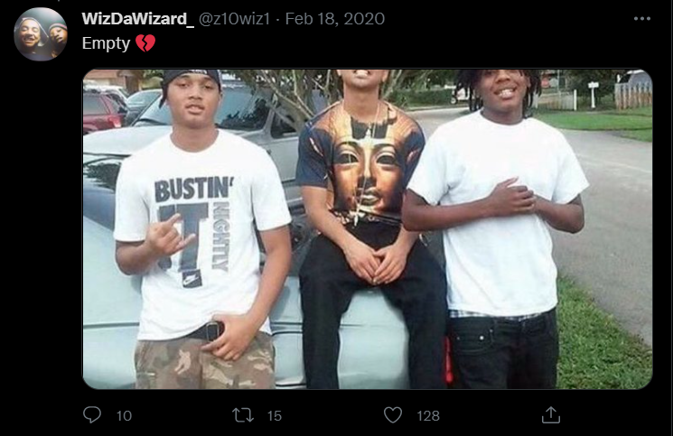 A group of people posing for the camera

Description automatically generated