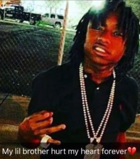 The Legacy Of T.Roy: The Chiraq Rambo 77 A picture containing text, outdoor, person
Description automatically generated