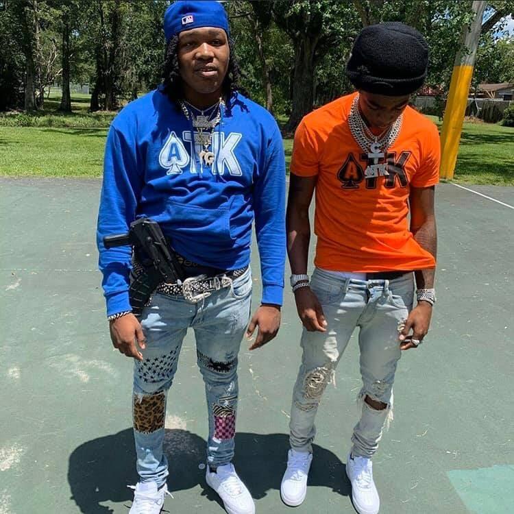 A picture containing person, tree, outdoor, skating

Description automatically generated