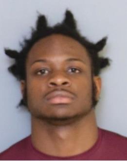 A picture containing person, wall, indoor, posing

Description automatically generated