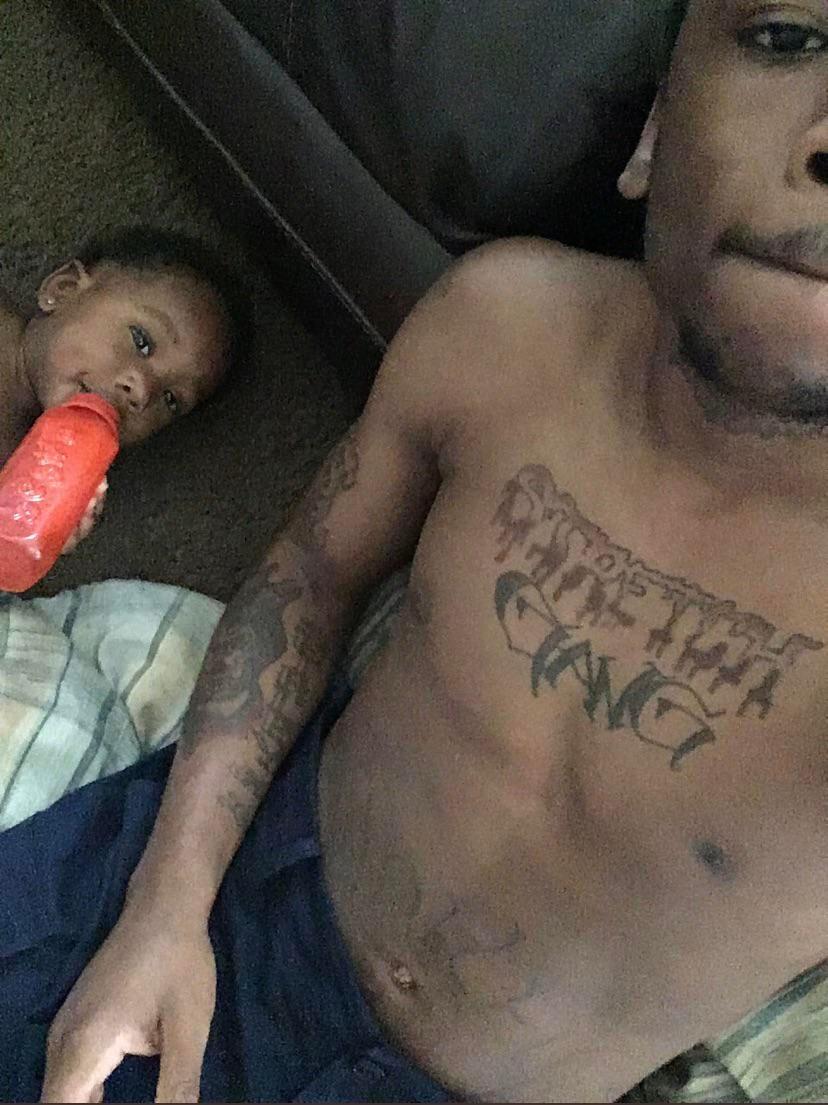 The Legacy Of T.Roy: The Chiraq Rambo 50 A picture containing person, indoor, tattoo
Description automatically generated