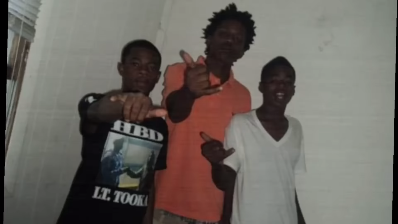 A group of men pointing at each other

Description automatically generated with medium confidence