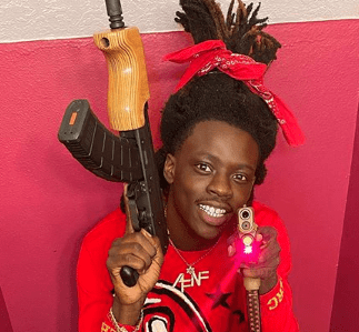 A picture containing person, indoor, red, little
Description automatically generated