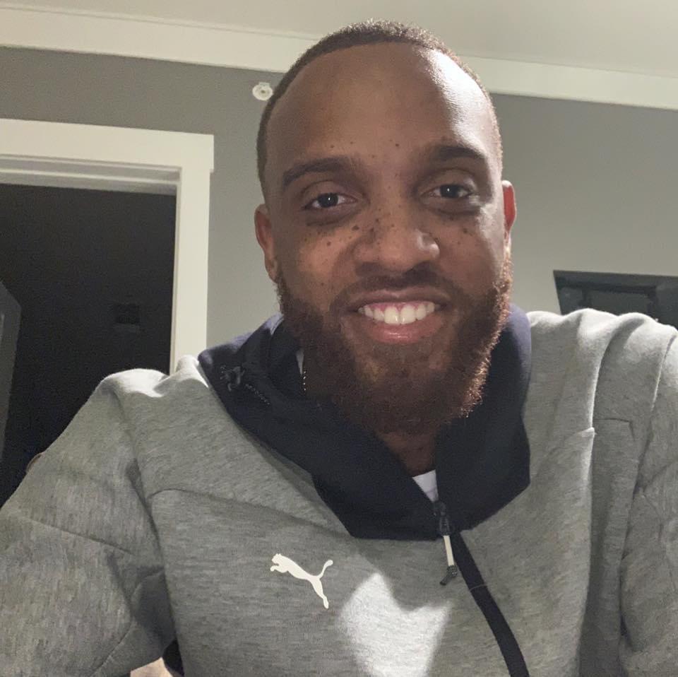 <strong>EST GEE: From Pro Athlete To Drug Kingpin To Rap Superstar</strong> 28 A person with a beard
Description automatically generated with low confidence