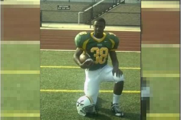 <strong>EST GEE: From Pro Athlete To Drug Kingpin To Rap Superstar</strong> 5 A picture containing grass, outdoor, player, athletic game
Description automatically generated