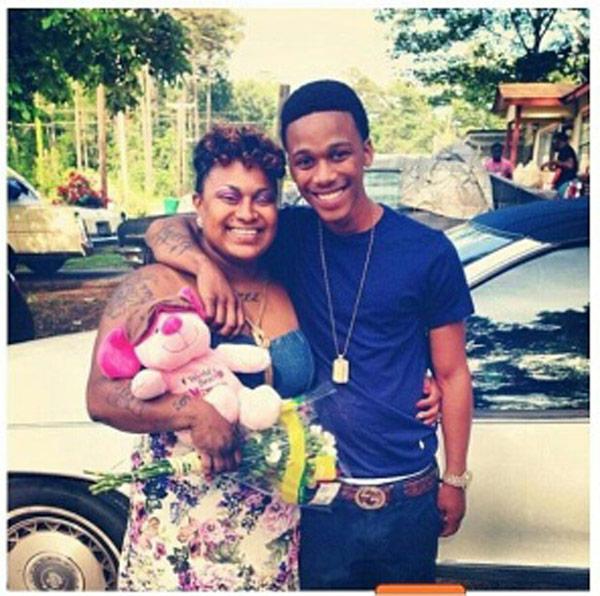 The Freestyle King Lil Snupe: Meek Mill Protégé’s Tragic Death 4 A person and person holding a baby
Description automatically generated with medium confidence