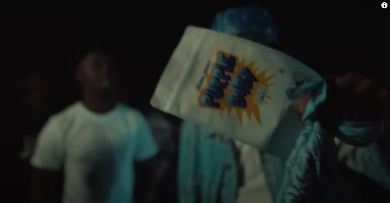The Rise And Fall of Quando Rondo’s Gang “Only The Mob” 33 A person holding a bag of food
Description automatically generated