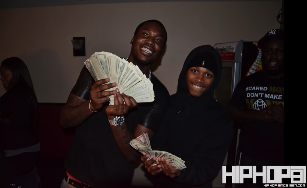 The Freestyle King Lil Snupe: Meek Mill Protégé’s Tragic Death 9 A picture containing text, person, wall, indoor
Description automatically generated