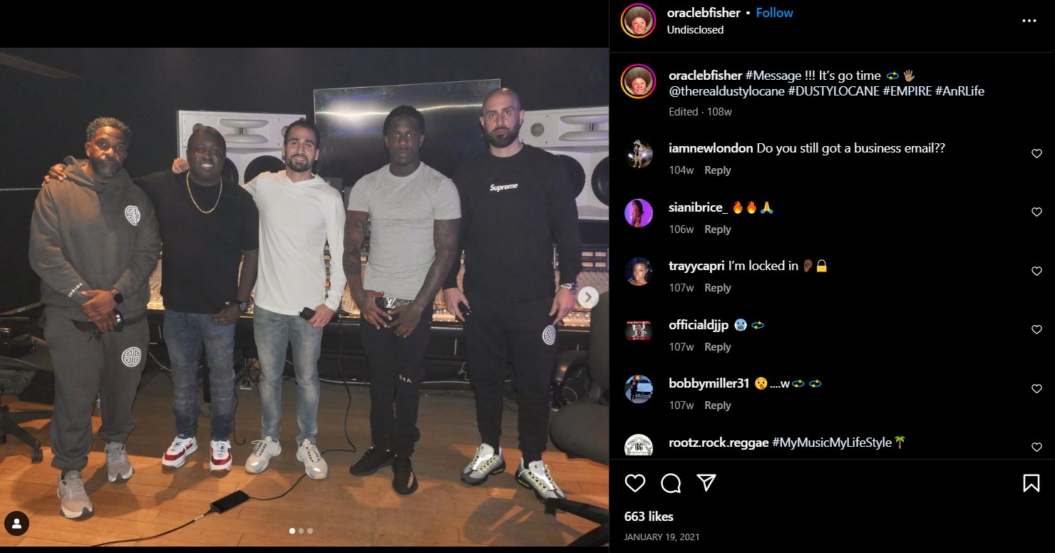 A group of men standing on a stage
Description automatically generated with medium confidence